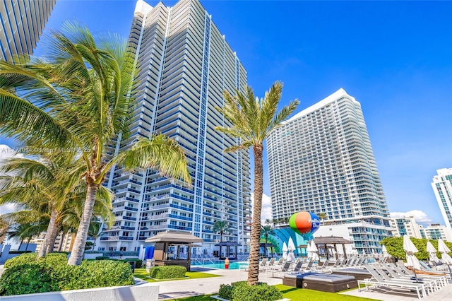 1830 S Ocean Dr Unit 2808, Hallandale Beach, FL 33009 - view of building exterior featuring a community pool