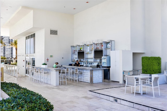 1830 S Ocean Dr Unit 2808, Hallandale Beach, FL 33009 - view of patio / terrace with an outdoor bar