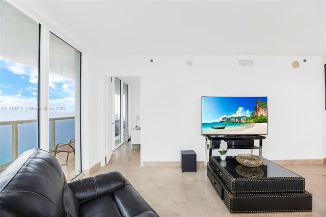 1830 S Ocean Dr Unit 2808, Hallandale Beach, FL 33009 - tiled living area featuring baseboards
