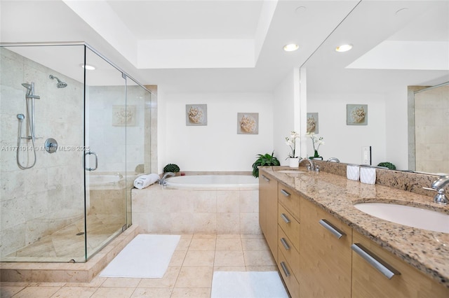 1830 S Ocean Dr Unit 2808, Hallandale Beach, FL 33009 - bathroom featuring a bath, double vanity, a shower stall, tile patterned floors, and recessed lighting