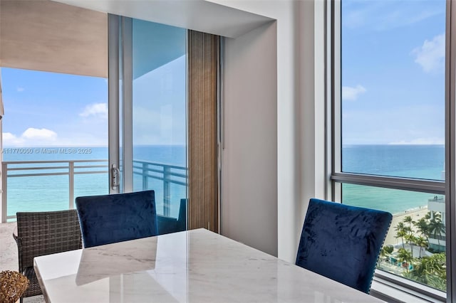 dining area with a water view