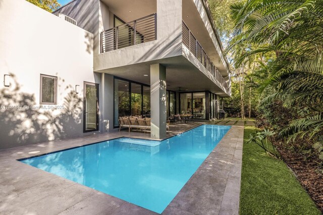 3232 Emathla St, Miami, FL 33133 - swimming pool featuring a patio area