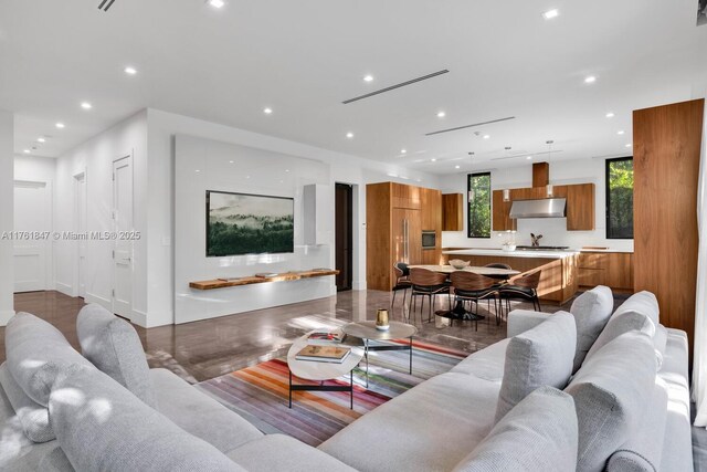 3232 Emathla St, Miami, FL 33133 - living area with recessed lighting and wood finished floors