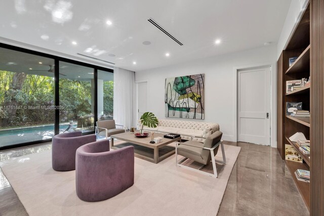 3232 Emathla St, Miami, FL 33133 - lobby with a wall of windows and recessed lighting