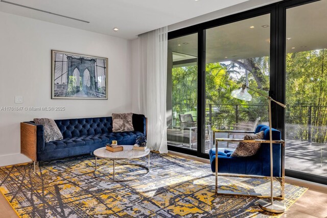 3232 Emathla St, Miami, FL 33133 - living area featuring expansive windows
