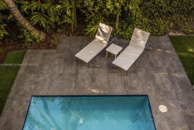 3232 Emathla St, Miami, FL 33133 - drone / aerial view of a pool
