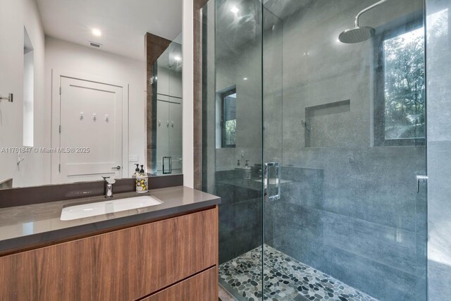 3232 Emathla St, Miami, FL 33133 - full bathroom with a stall shower and vanity