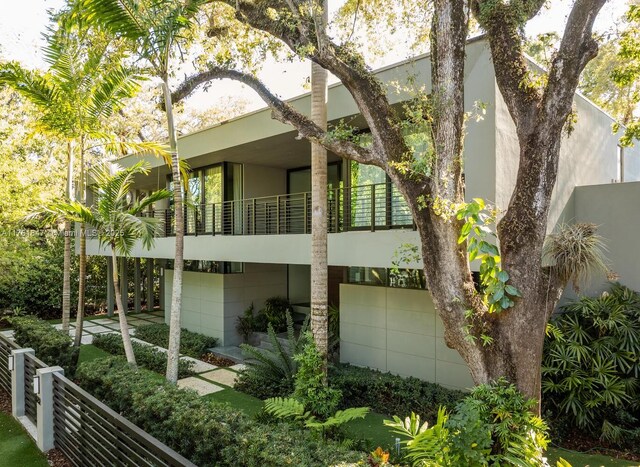 3232 Emathla St, Miami, FL 33133 - back of property with a balcony