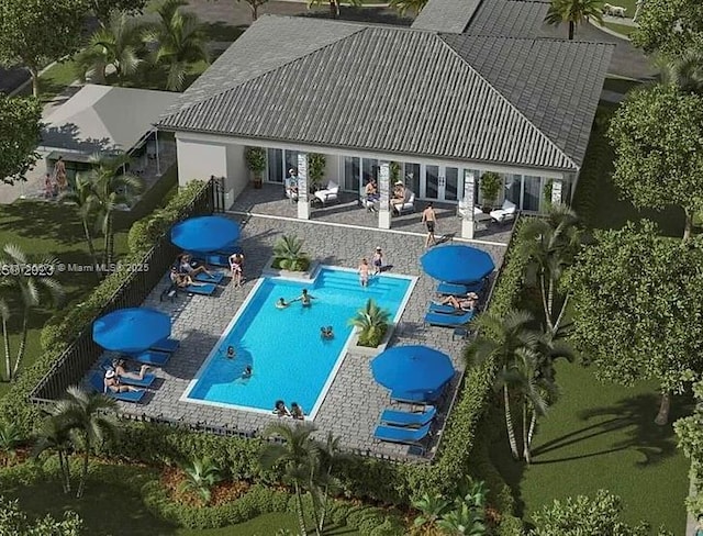 community pool featuring a patio area