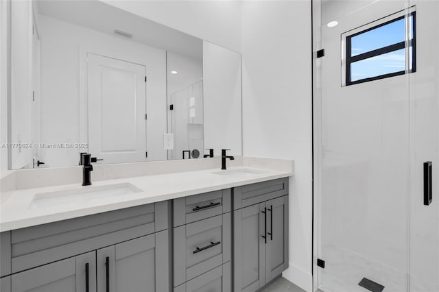 3217 SW 23rd St, Lehigh Acres, FL 33976 - bathroom with double vanity, a sink, and a shower stall