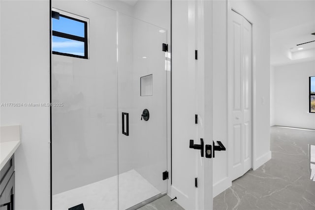 3217 SW 23rd St, Lehigh Acres, FL 33976 - full bath with a closet, marble finish floor, a stall shower, and vanity