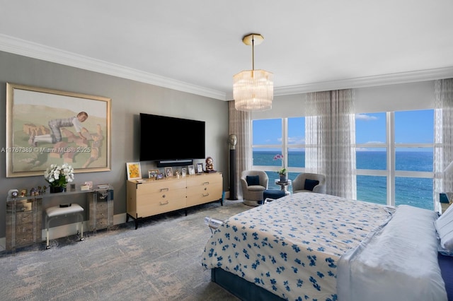 carpeted bedroom featuring an inviting chandelier and ornamental molding