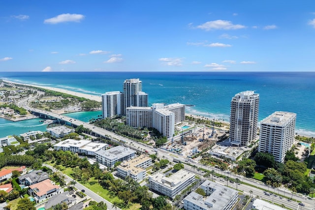 aerial view featuring a view of city and a water view