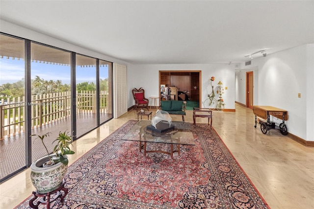 1 Grove Isle Dr Unit A409, Miami, FL 33133 - living area featuring baseboards and tile patterned floors