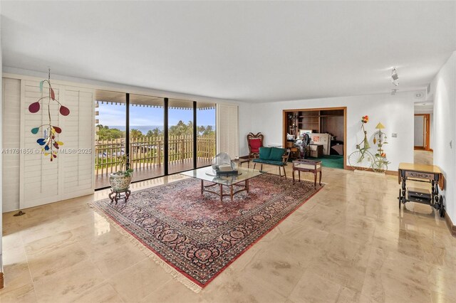 1 Grove Isle Dr Unit A409, Miami, FL 33133 - living area with a wall of windows