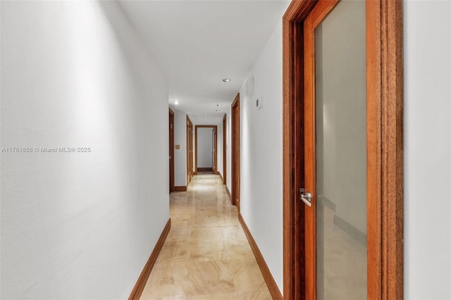 1 Grove Isle Dr Unit A409, Miami, FL 33133 - hall with baseboards and recessed lighting