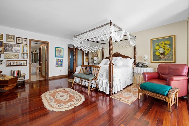 1 Grove Isle Dr Unit A409, Miami, FL 33133 - bedroom with wood finished floors and baseboards