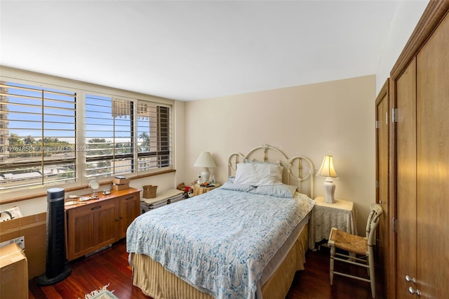 1 Grove Isle Dr Unit A409, Miami, FL 33133 - bedroom featuring dark wood-type flooring