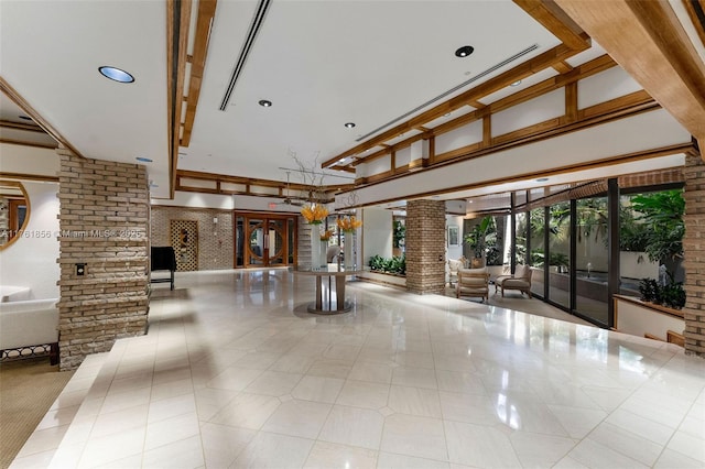 1 Grove Isle Dr Unit A409, Miami, FL 33133 - common area with recessed lighting and a towering ceiling