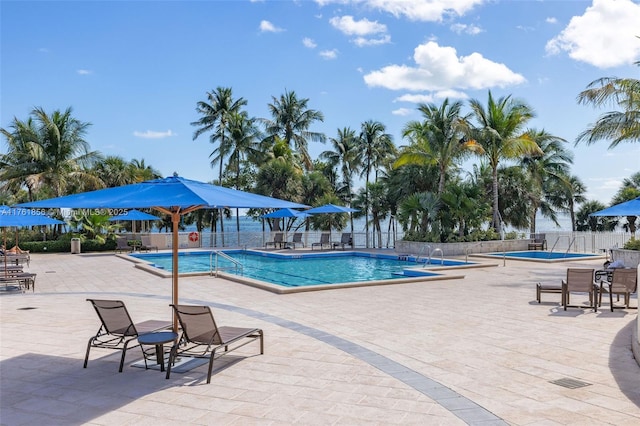1 Grove Isle Dr Unit A409, Miami, FL 33133 - community pool featuring a patio