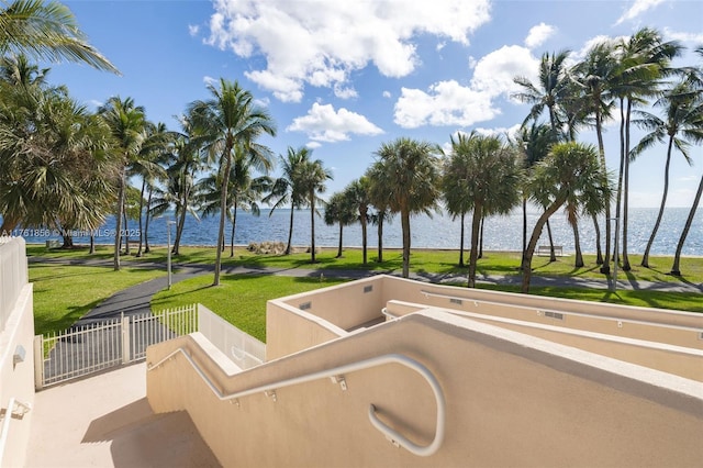 1 Grove Isle Dr Unit A409, Miami, FL 33133 - view of pool with a water view and a lawn