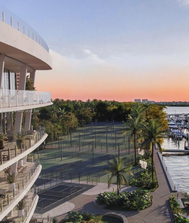 1 Grove Isle Dr Unit A409, Miami, FL 33133 - view of tennis court featuring a water view