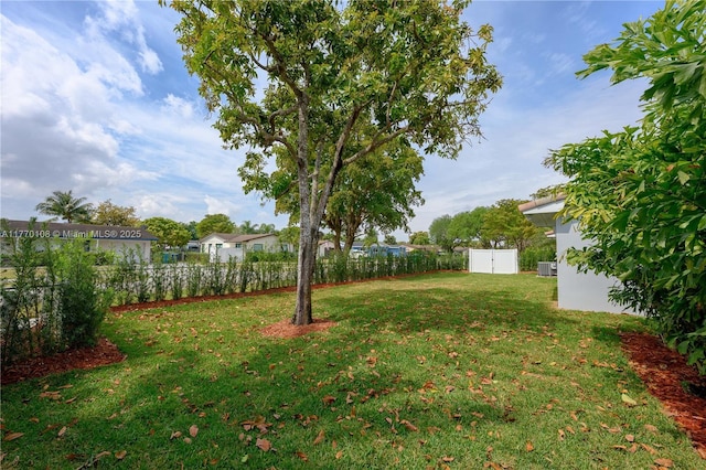 view of yard with fence