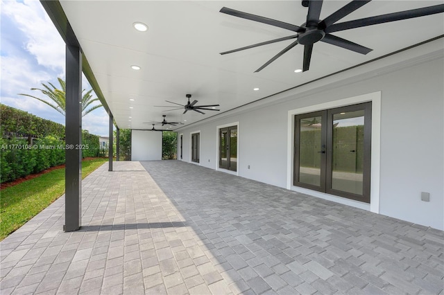 view of patio / terrace with ceiling fan and french doors