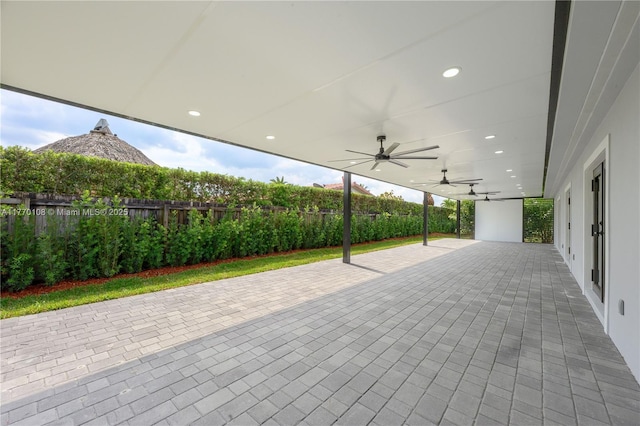 view of patio featuring ceiling fan and a fenced backyard