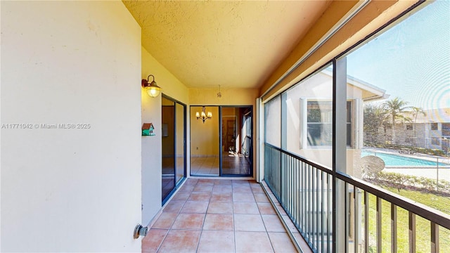 1140 Independence Trl Unit 1140-D, Homestead, FL 33034 - unfurnished sunroom with a notable chandelier