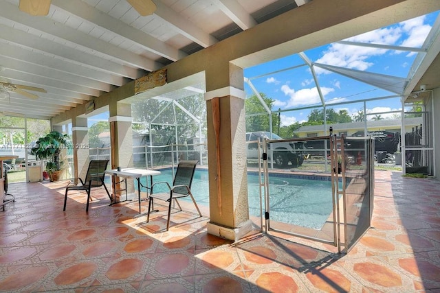 8480 Caribbean Blvd, Cutler Bay, FL 33157 - outdoor pool featuring glass enclosure, ceiling fan, and a patio