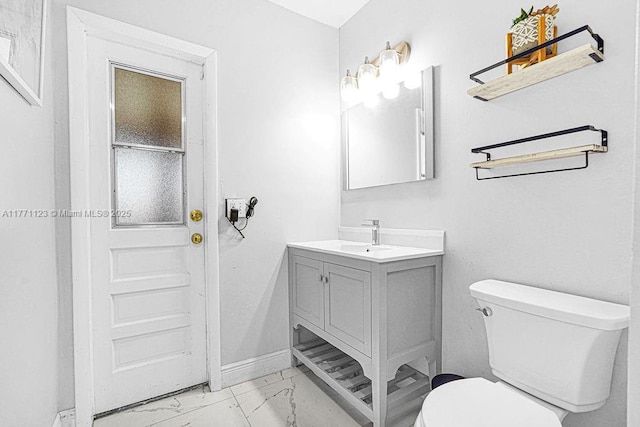 8480 Caribbean Blvd, Cutler Bay, FL 33157 - bathroom featuring marble finish floor, baseboards, toilet, and vanity