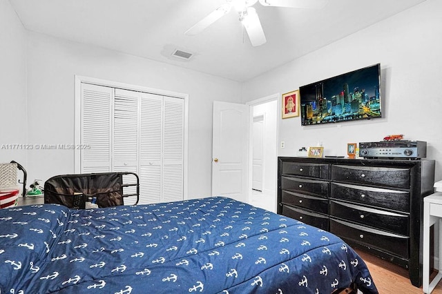 8480 Caribbean Blvd, Cutler Bay, FL 33157 - bedroom with a closet, visible vents, ceiling fan, and wood finished floors