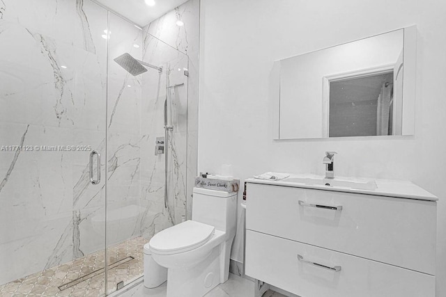 8480 Caribbean Blvd, Cutler Bay, FL 33157 - bathroom featuring toilet, marble finish floor, vanity, and a marble finish shower