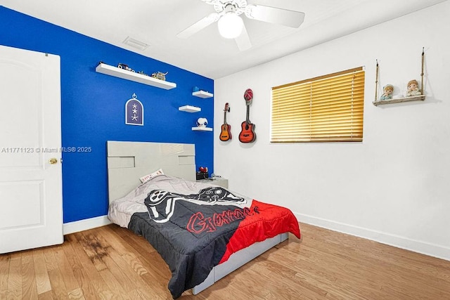 8480 Caribbean Blvd, Cutler Bay, FL 33157 - bedroom with wood finished floors, baseboards, ceiling fan, and visible vents