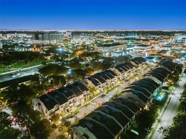 birds eye view of property featuring a view of city