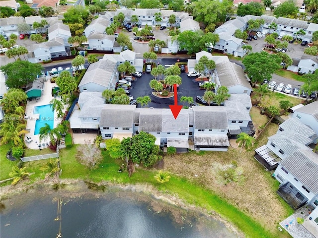 aerial view featuring a residential view and a water view