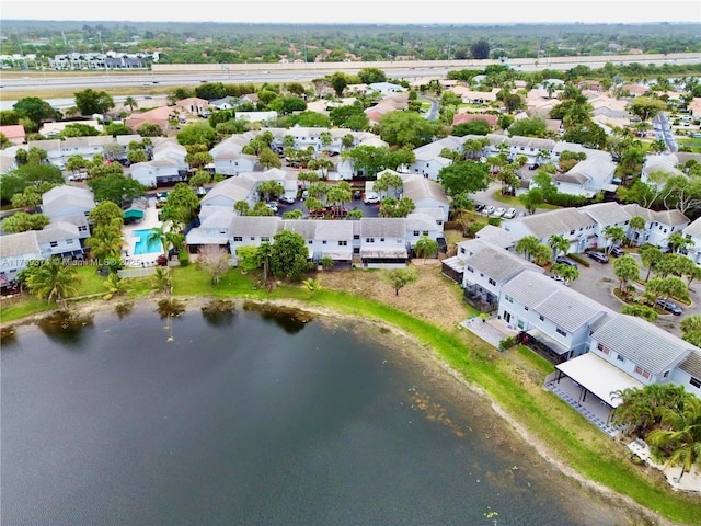 aerial view featuring a water view and a residential view