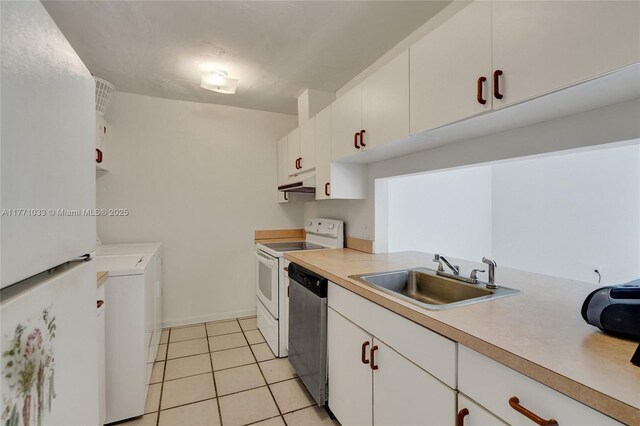 kitchen featuring white electric stove, dishwasher, under cabinet range hood, a sink, and washer and clothes dryer
