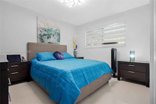 bedroom with light tile patterned flooring