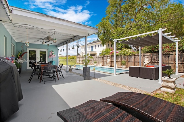 view of patio with a pergola, outdoor lounge area, french doors, a fenced backyard, and ceiling fan