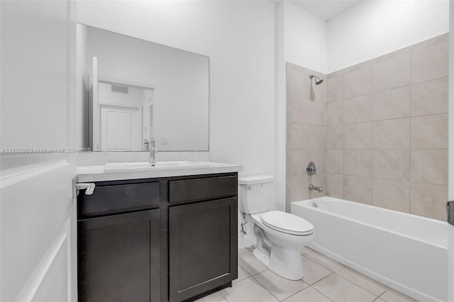 full bathroom with visible vents, toilet, tile patterned floors, vanity, and shower / bathtub combination