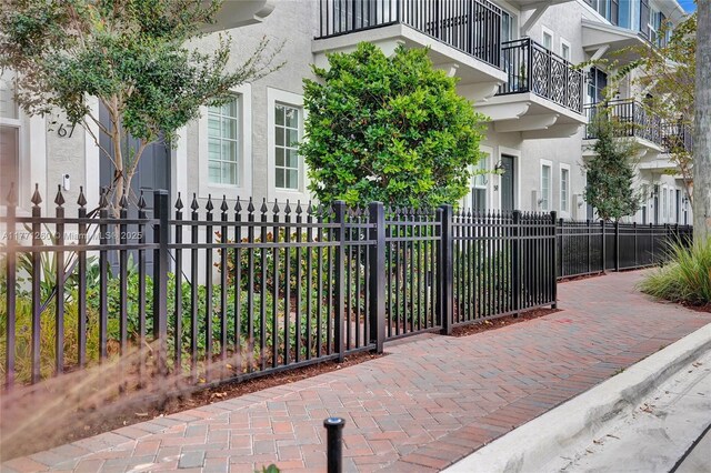 63 NW 4th Ave, Delray Beach, FL 33444 - exterior space with stucco siding and a fenced front yard