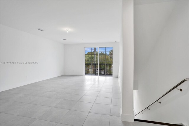 63 NW 4th Ave, Delray Beach, FL 33444 - spare room featuring light tile patterned flooring and visible vents