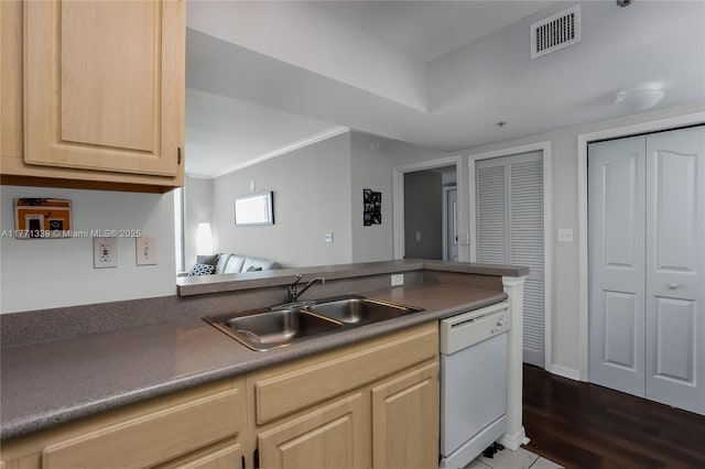 2665 SW 37th Ave Unit 1404, Miami, FL 33133 - kitchen featuring dishwasher, light brown cabinets, crown molding, dark countertops, and dark wood finished floors