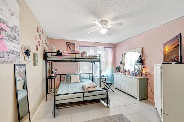 2307 N Congress Ave Unit 28, Boynton Beach, FL 33426 - bedroom with a textured ceiling, light tile patterned floors, and ceiling fan