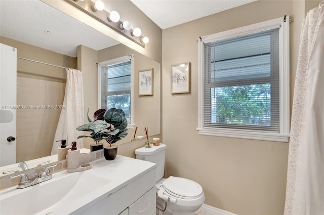 2307 N Congress Ave Unit 28, Boynton Beach, FL 33426 - full bath with healthy amount of natural light, toilet, vanity, and curtained shower