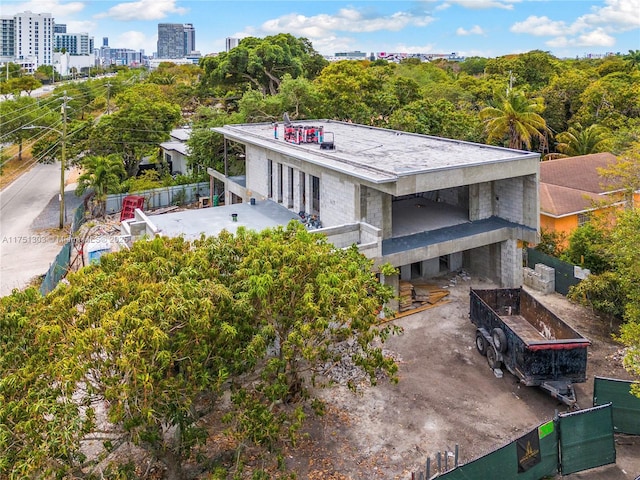 birds eye view of property with a city view