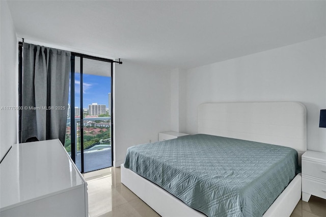 20515 E Country Club Dr Unit 1641, Aventura, FL 33180 - bedroom featuring light tile patterned flooring, expansive windows, a view of city, and access to outside