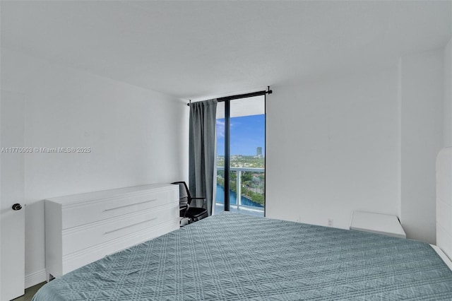 20515 E Country Club Dr Unit 1641, Aventura, FL 33180 - bedroom featuring floor to ceiling windows